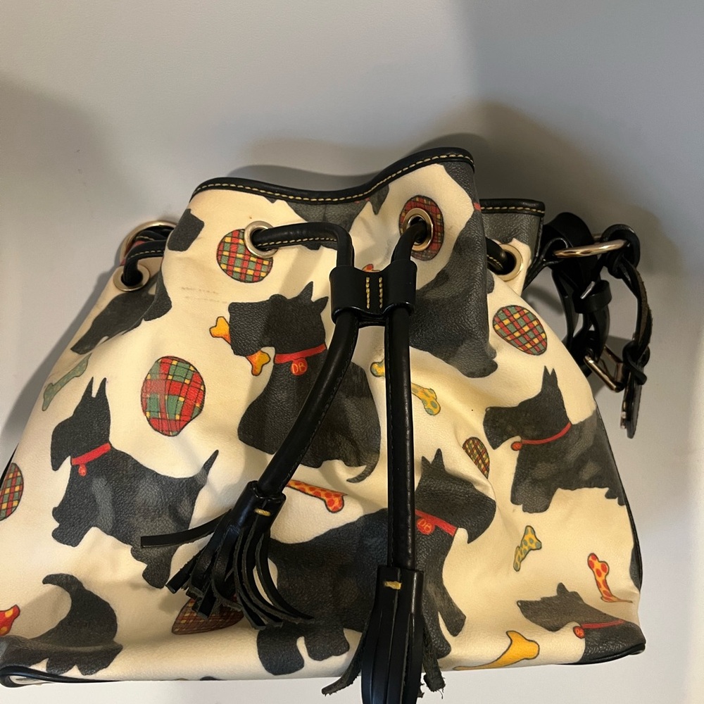 Dooney & Bourke Black and Cream Dog Print Bucket Bag